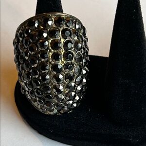 Copper toned ring with sparkly crystals. Heavy. 23g. Size 8.